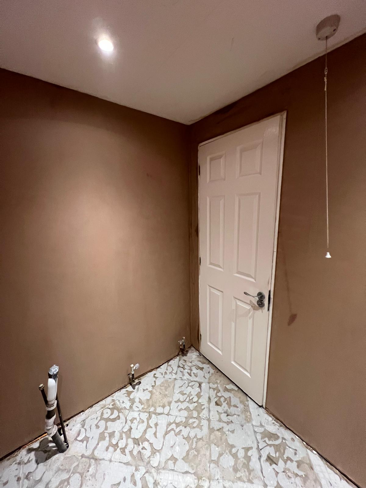 Smooth plastered bathroom finish